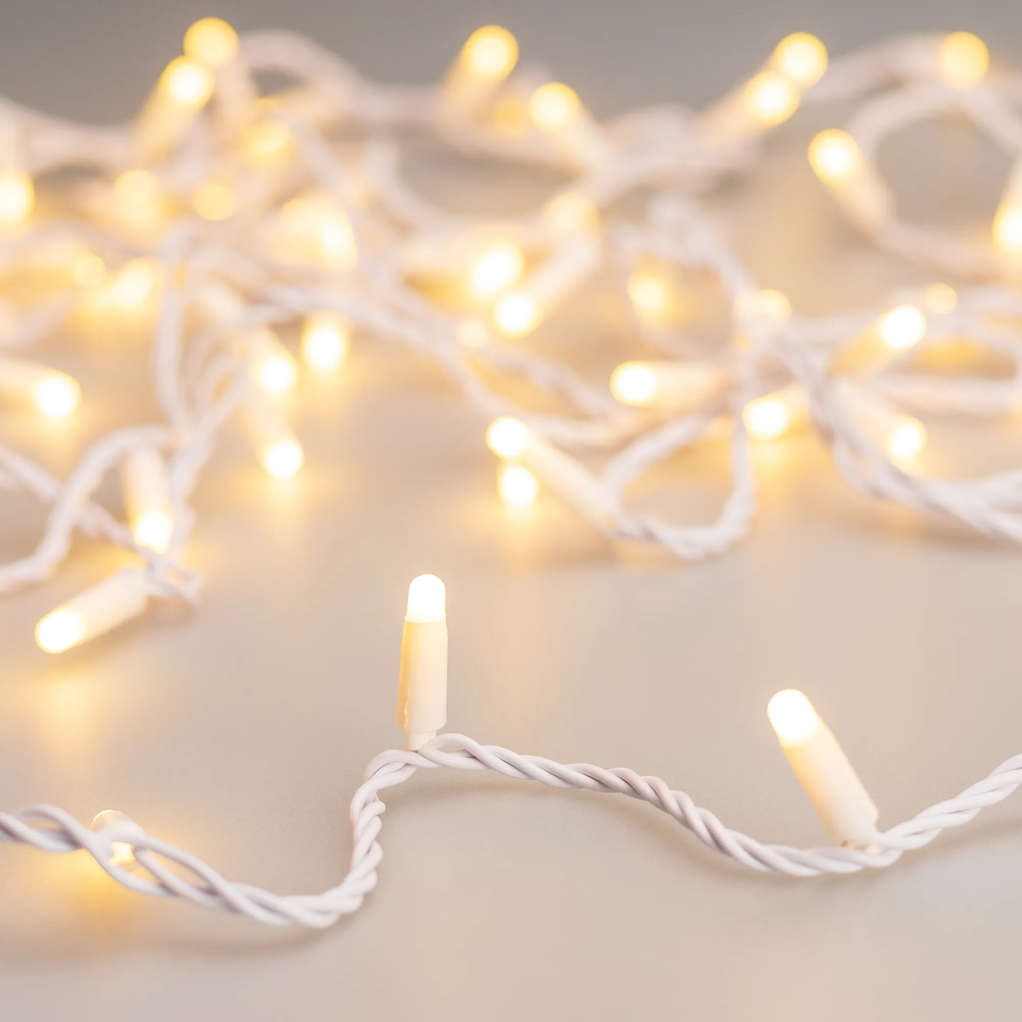 Светодиодная гирлянда ARD-STRING-CLASSIC-10000-WHITE-100LED-MILK-STD Warm (230V, 7W) (Ardecoled, IP65) - изображение товара